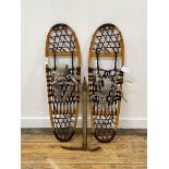 A vintage pair of Vermont Tubbs bentwood snow shoes, stamped by maker (L92cm) together with a