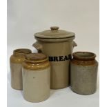 A group of stoneware storage jars including a large handled bread crock (marked verso) (h- 35cm,