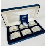 A set of six silver Queen Elizabeth II oval napkin rings in presentation box, with original sealed