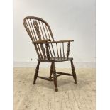 A 19th century ash and fruit wood Windsor armchair, double hoop, spindle and splat back over