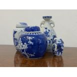 A modern Chinese porcelain blue and white ginger jar and cover with prunus decoration, (H12cm)
