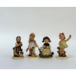 A group of four Hummel figures comprising "Will it sting", "The Botanist", "Spring Cheer" and "