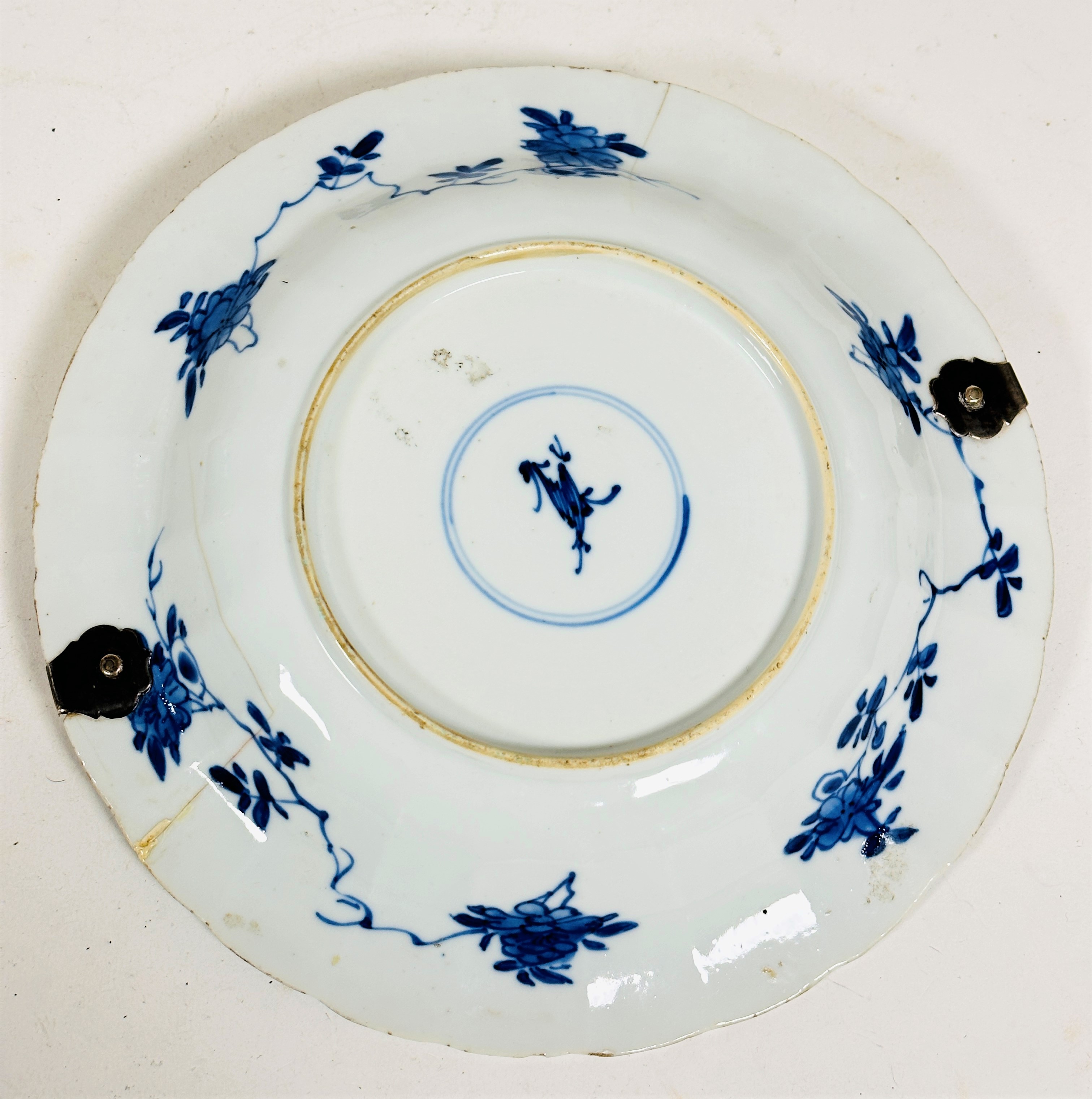 A 19thc Chinese blue and white scalloped dish decorated with central scene with storks and pond, - Image 2 of 2