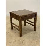 A late Qing Dynasty Chinese elm Mahjong or games table, the panelled top over drawer to each side,