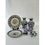 A collection of blue and white including a pair of Chinese crackle glazed baluster vases decorated