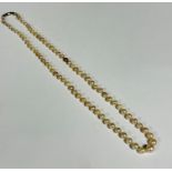 A natural pearl graduated necklace with 9ct white gold barrel clasp fastening, (L: 21cm) pearls of
