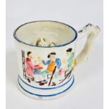 A 19thc pottery mug decorated with moulded tavern scene figures of Tam O'Shanter and Souter Johnny
