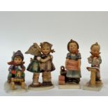 A group of four Hummel figures comprising "Ride into Christmas", "Telling Her Secret" (h- 14.