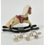 A treen painted miniature rocking horse with fur mane and straw tail, (h: 16cm x 22cm) and a set