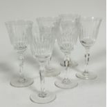 A set of six crystal moulded thumb cut red wine glasses, (h: 20cm x 8.5cm) on facted stemps and
