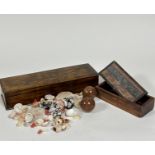 An Edwardian rectangular treen box with hinged cover with stylised shield and branch design, with