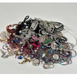 A large collection of costume jewellery including multiple strand bead necklaces, cultured pearl and