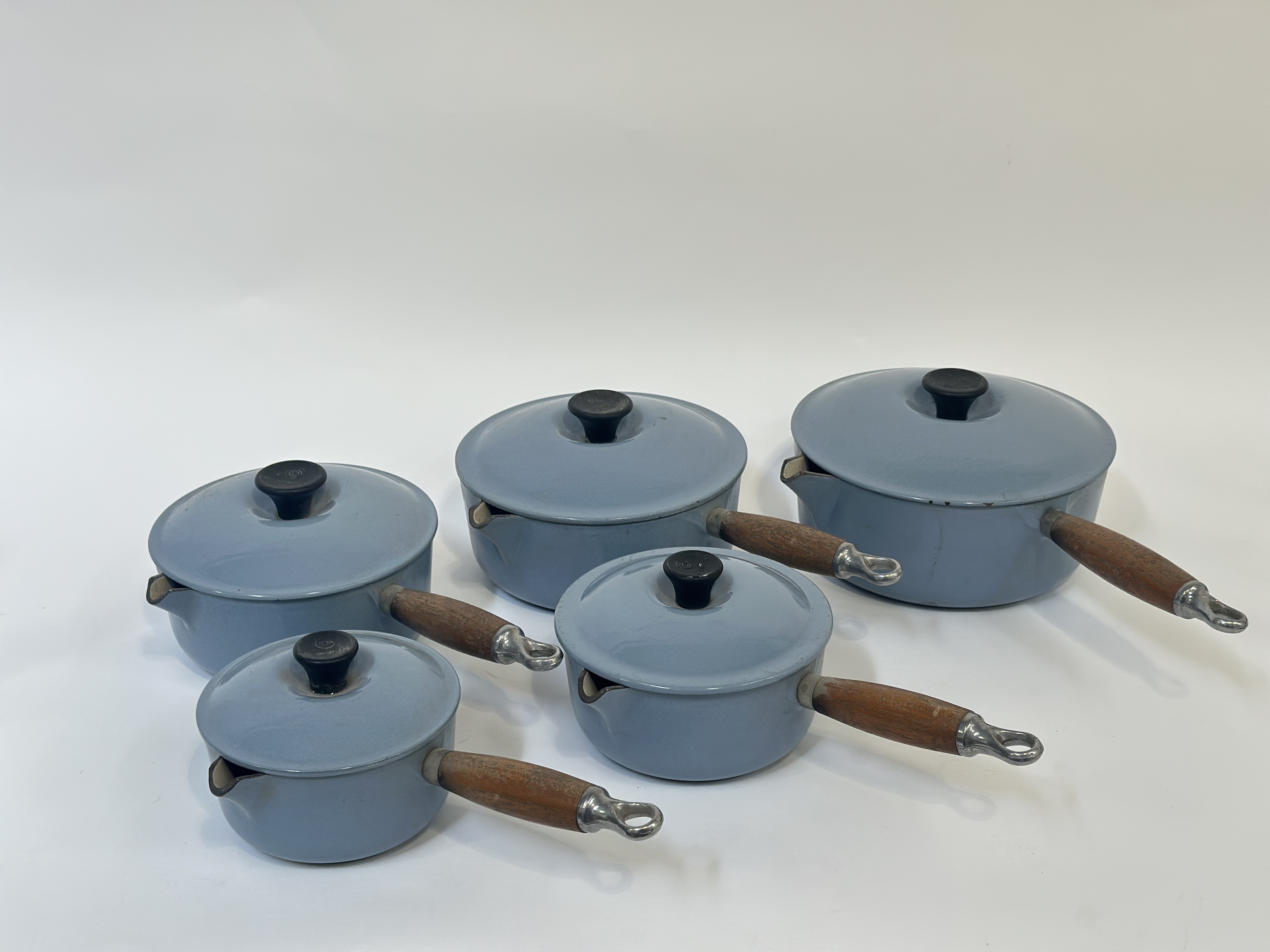 A group of five Le Creuset cast iron pans with duck egg blue enamelling with wooden handles, - Image 2 of 3