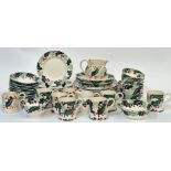 Emma Bridgewater, Holly decorated part breakfast set comprising a milk jug (h- 11cm), a pitcher (