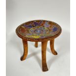 African treen four leg stool, the circular concave top with studded beaded figures including
