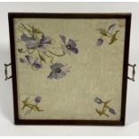 An Edwardian oak framed two hand brass twin handled tea tray with damask pale green silk panel