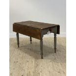 A Victorian painted pine kitchen drop leaf dining table, the rectangular top over drawer to one end,