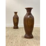 A large pair of turned mango wood baluster vases, H80cm