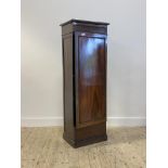 A Victorian rosewood and walnut pedestal cabinet, the single panelled door enclosing seven