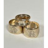 A pair of 1937 Birmingham silver circular napkin rings with engraved RBD, (h: 3cm x 4cm) (55.75g)