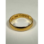 A 22ct gold wedding band, (M) (1.92g)