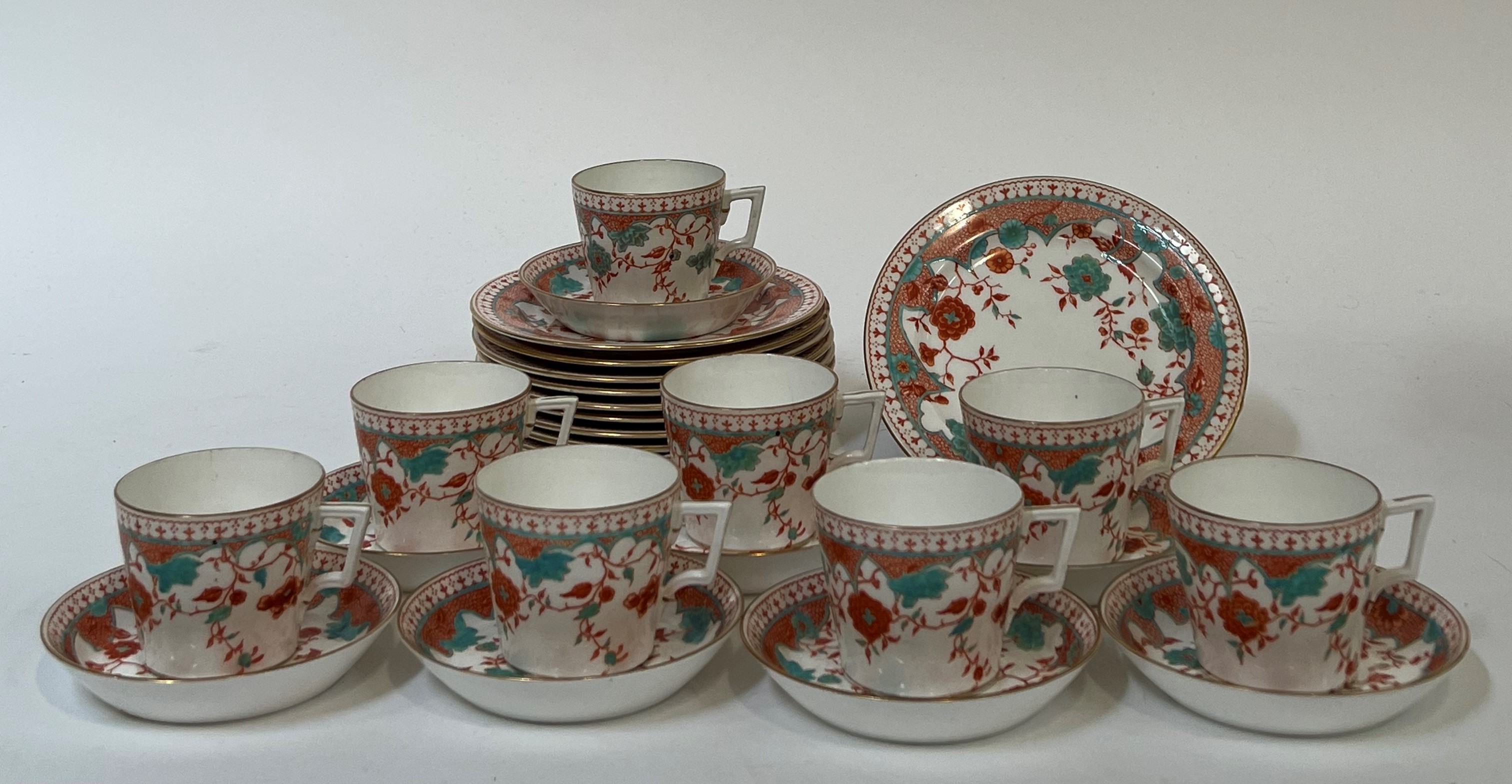 Royal Crown Derby, a part tea service comprising nine teacups (h- 6.5cm), thirteen saucers (w- 13cm)