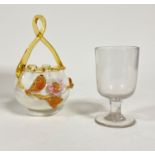 An Art glass posy basket with amber glass scroll loop handle and moulded crimped top with applied