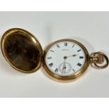 A Waltham gold plated full hunter pocket watch with glazed enamelled dial with Roman numerals and