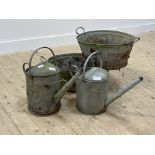 A near pair of glavanised metal watering cans (H45cm) together with two galvanised baths (larger