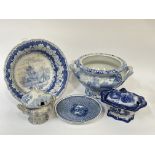 A collective group of blue and white comprising a small tureen and cover with a transfer print of