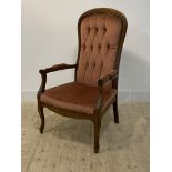 An early 20th century stained beech framed open armchair, the high back, open arms and seat