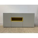 A quality contemporary grey and yellow laminate sideboard, the centre fitted with a fall front
