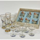 A set of four high ball tapered drinking glasses, (h: 17cm x 8cm) decorated with mallard bird in