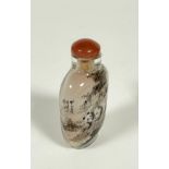 A carved agate snuff bottle with jadeite button top, (h: 7cm x 5cm x 3.5cm), a late 19th / early