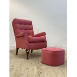 A Victorian style armchair, upholstered in buttoned hot pink linen, raised on cabriole front