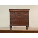 A miniature scottish Victorian mahogany chest, the cross banded and boxwood strung top over two