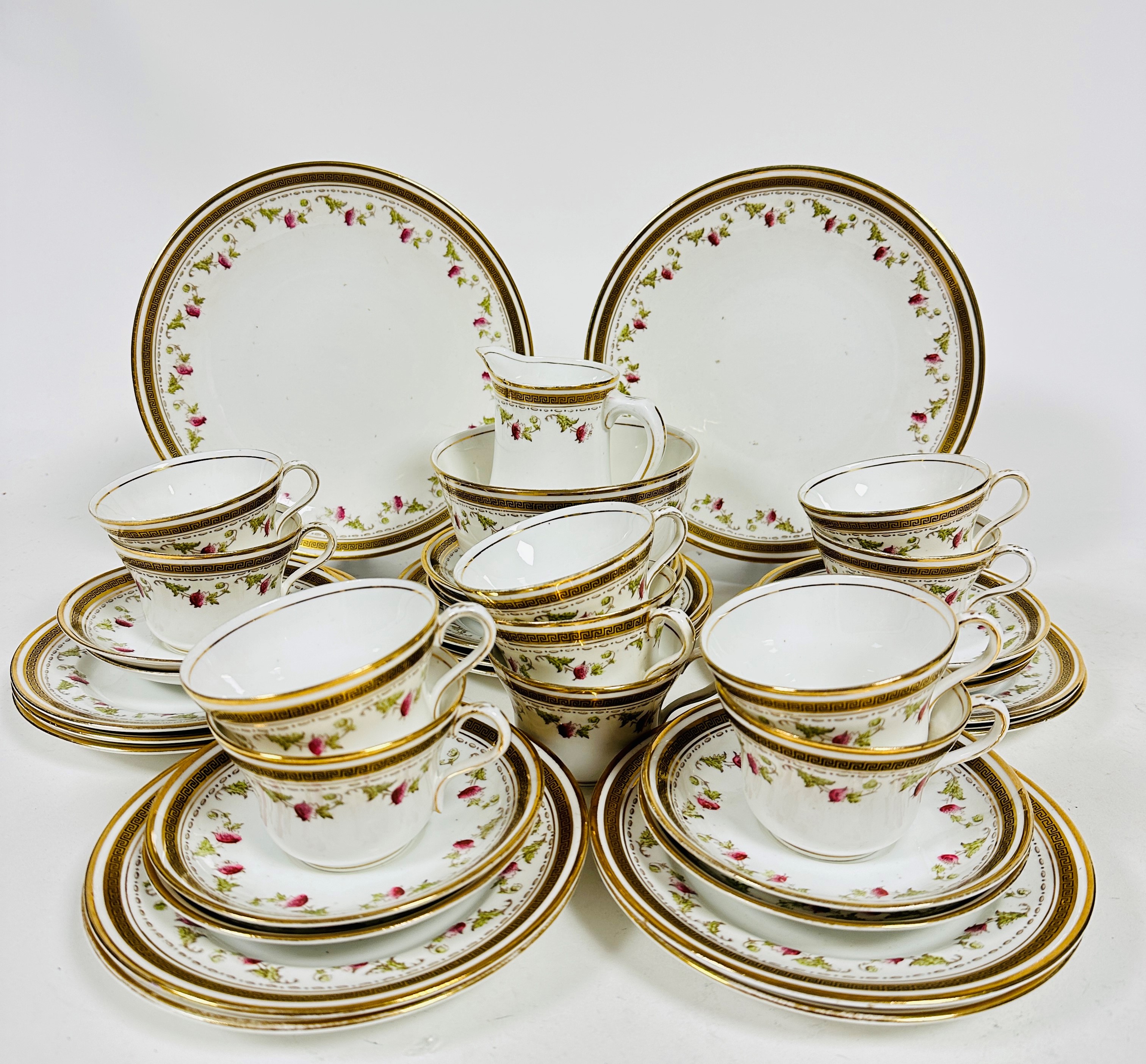 A Royal Albert thirty nine piece tea set including two cake plates, (d: 23cm), twelve side