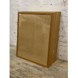 A group of twenty art glass glazed hardwood picture frames, each complete with backing 84cm x 100cm