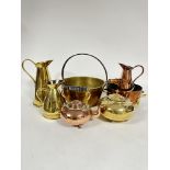 A collection of late 19th / early 20thc brass and copperware including a brass water ewer with C