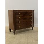 A Scottish Regency mahogany break bow front chest, fitted with three short and three long