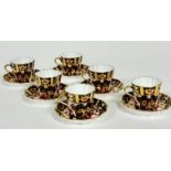 A set of six Wedgwood 1900-1930 green Imari style decorated fluted tea cups with matching saucers,