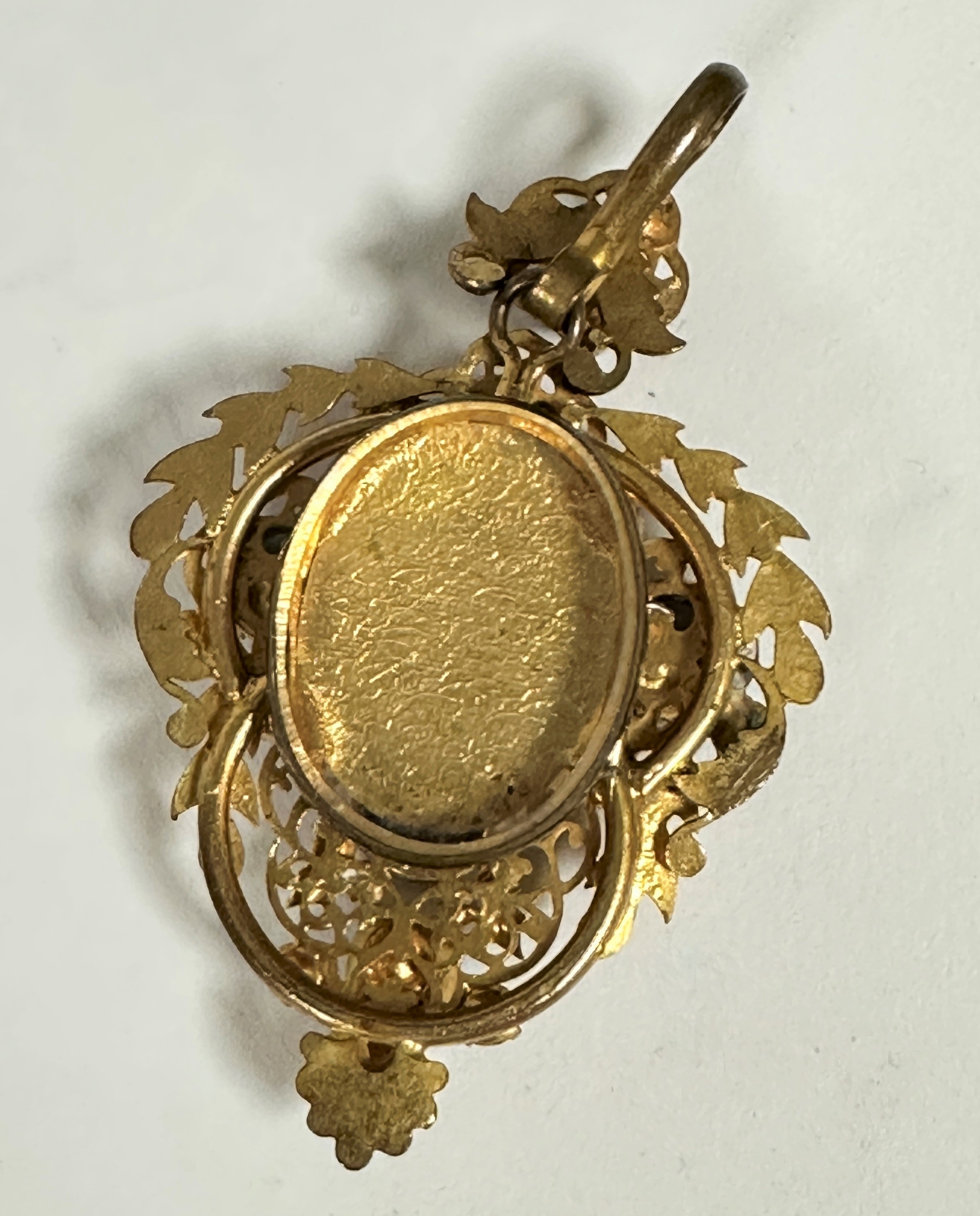 A gilt metal open work paste set cruciform pendant with laurel reef border and a detachable loop - Image 2 of 6