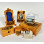 A mauchline ware satinwood rococo style photograph frame with Dunstaffage Castle, Oban, and Oban