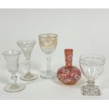 A 19thc thumb cut crystal tulip shaped cordial glass with acorn knop (11cm x 5cm), shows no signs of