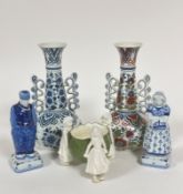 A pair of modern Delft slim neck baluster vases with scrolling handles to side, one decorated in