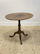 A George III mahogany tripod table, circular snap top (a/f) raised on ring turned column and