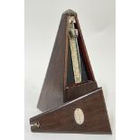 A mid-20th century French wooden cased Maelzel Paquet metronome (h- 22cm)