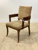 An Edwardian mahogany desk chair, the back and seat upholstered in floral patterned cut velvet,