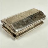An 18thc Dutch white metal panelled snuff box with traditional floral scrolling decoration and plain