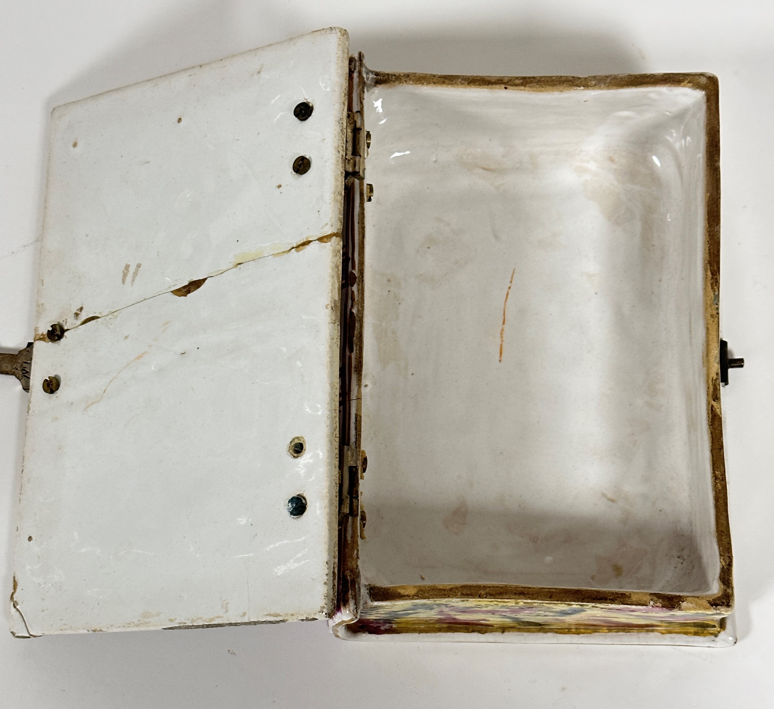 An early 19thc French faience pottery box in the form of a hinged book, the cover with cast white - Image 8 of 10